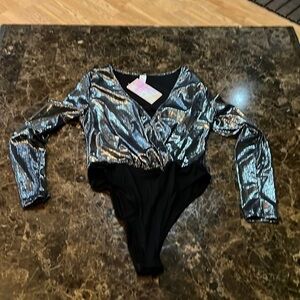 NWT small body suit. A50